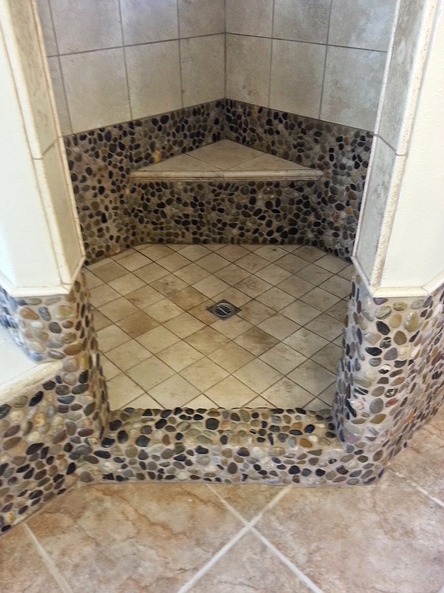 small shower with stone